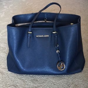 Navy blue Michael Kors purse
